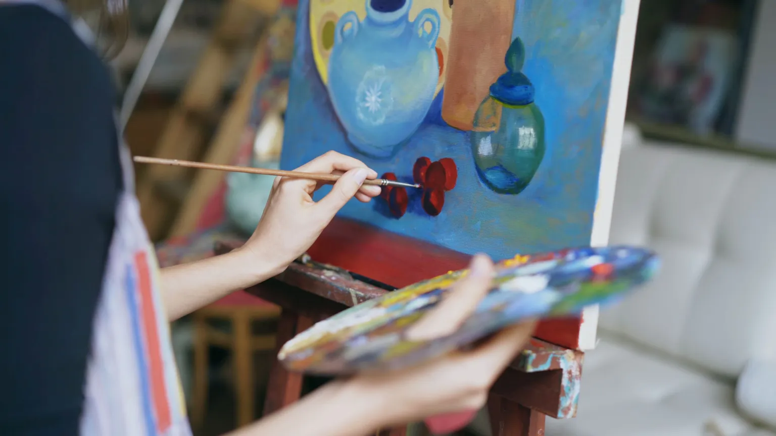 Students creating artwork in a 24 Art class